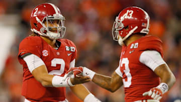 TAMPA, FL - JANUARY 09: Quarterback Jalen Hurts #2 of the Alabama Crimson Tide celebrates with wide receiver ArDarius Stewart #13 after throwing a 68-yard touchdown pass during the third quarter against the Clemson Tigers in the 2017 College Football Playoff National Championship Game at Raymond James Stadium on January 9, 2017 in Tampa, Florida. (Photo by Kevin C. Cox/Getty Images)