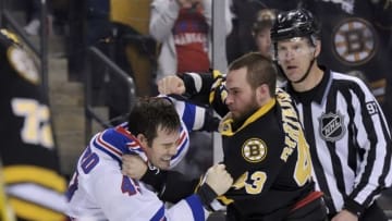 Mar 28, 2015; Boston, MA, USA; New York Rangers left wing James Sheppard (45) fights with Boston Bruins defenseman Matt Bartkowski (43) during the third period at TD Banknorth Garden. Mandatory Credit: Bob DeChiara-USA TODAY Sports
