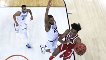 PITTSBURGH, PA - MARCH 17: Collin Sexton #2 of the Alabama Crimson Tide shoots the ball against Mikal Bridges #25 of the Villanova Wildcats in the second round of the 2018 NCAA Men's Basketball Tournament at PPG PAINTS Arena on March 17, 2018 in Pittsburgh, Pennsylvania. (Photo by Rob Carr/Getty Images)