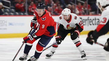 WASHINGTON, DC - JANUARY 07: Dmitry Orlov #9 of the Washington Capitals skates past Tyler Ennis #63 of the Ottawa Senators during the second period at Capital One Arena on January 07, 2020 in Washington, DC. (Photo by Patrick Smith/Getty Images)