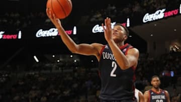 Dec 29, 2015; Atlanta, GA, USA; Duquesne Dukes guard Eric James (2) shoots the ball against the Georgia Tech Yellow Jackets in the second half at McCamish Pavilion. The Yellow Jackets won 73-67. Mandatory Credit: Brett Davis-USA TODAY Sports