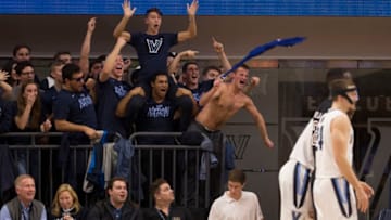 VILLANOVA, PA - DECEMBER 05: The Villanova Wildcats student section attempts to distract Shizz Alston Jr. #10 of the Temple Owls (not pictured) during a foul shot in the first half at Finneran Pavilion on December 5, 2018 in Villanova, Pennsylvania. (Photo by Mitchell Leff/Getty Images)