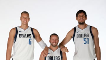 OKC Thunder Team Previews: Kristaps Porzingis #6, J.J. Barea #5 and Boban Marjanovic #51 of the Dallas Mavericks (Photo by Glenn James/NBAE via Getty Images)