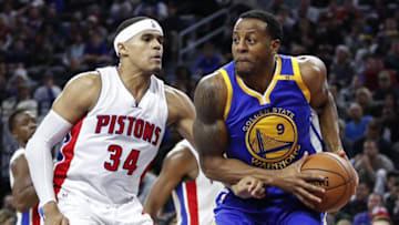 Dec 23, 2016; Auburn Hills, MI, USA; Golden State Warriors forward Andre Iguodala (9) gets defended by Detroit Pistons forward Tobias Harris (34) during the second quarter at The Palace of Auburn Hills. Mandatory Credit: Raj Mehta-USA TODAY Sports