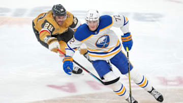 Dec 19, 2022; Las Vegas, Nevada, USA; Buffalo Sabres center Tage Thompson (72) skates around Vegas Golden Knights left wing William Carrier (28) during the third period at T-Mobile Arena. Mandatory Credit: Stephen R. Sylvanie-USA TODAY Sports