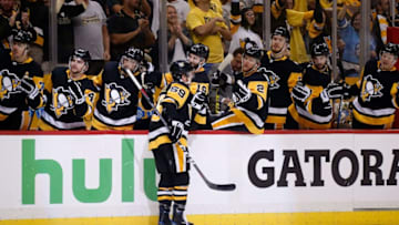 PITTSBURGH, PA - MAY 03: Jake Guentzel #59 of the Pittsburgh Penguins celebrates with teammates after scoring a goal during the second period in Game Four of the Eastern Conference Second Round during the 2018 NHL Stanley Cup Playoffs against the Washington Capitals at PPG PAINTS Arena on May 3, 2018 in Pittsburgh, Pennsylvania. (Photo by Kirk Irwin/Getty Images)