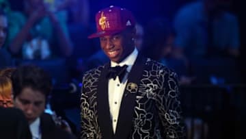 Jun 26, 2014; Brooklyn, NY, USA; Andrew Wiggins (Kansas) walks off stage after being selected as the number one overall pick to the Cleveland Cavaliers in the 2014 NBA Draft at the Barclays Center. Mandatory Credit: Brad Penner-USA TODAY Sports