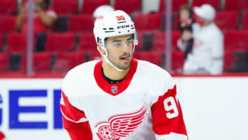 Apr 29, 2021; Raleigh, North Carolina, USA; Detroit Red Wings center Joe Veleno (90) skates before the game against the Carolina Hurricanes at PNC Arena. Mandatory Credit: James Guillory-USA TODAY Sports