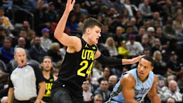 SALT LAKE CITY, UTAH - NOVEMBER 01: Walker Kessler #24 of the Utah Jazz defends Desmond Bane #22 of the Memphis Grizzlies during the first half of a game at Delta Center on November 01, 2023 in Salt Lake City, Utah. NOTE TO USER: User expressly acknowledges and agrees that, by downloading and or using this photograph, User is consenting to the terms and conditions of the Getty Images License Agreement. (Photo by Alex Goodlett/Getty Images)