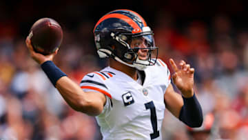CHICAGO, ILLINOIS - SEPTEMBER 25: Justin Fields #1 of the Chicago Bears looks to pass against the Houston Texans during the first quarter at Soldier Field on September 25, 2022 in Chicago, Illinois. (Photo by Michael Reaves/Getty Images)