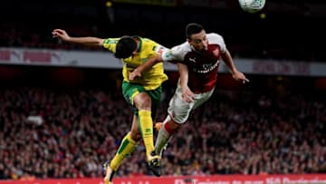 LONDON, ENGLAND - OCTOBER 24: Timm Klose of Norwich City and Francis Coquelin of Arsenal clash during the Carabao Cup Fourth Round match between Arsenal and Norwich City at Emirates Stadium on October 24, 2017 in London, England. (Photo by Shaun Botterill/Getty Images)