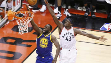 TORONTO, CANADA - MAY 30: Draymond Green #23 of the Golden State Warriors shoots the ball against the Toronto Raptors during Game One of the NBA Finals on May 30, 2019 at Scotiabank Arena in Toronto, Ontario, Canada. NOTE TO USER: User expressly acknowledges and agrees that, by downloading and/or using this photograph, user is consenting to the terms and conditions of the Getty Images License Agreement. Mandatory Copyright Notice: Copyright 2019 NBAE (Photo by Chris Elise/NBAE via Getty Images)