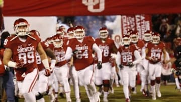Nov 21, 2015; Norman, OK, USA; Oklahoma Sooners players run onto the field before the game against the TCU Horned Frogs at Gaylord Family - Oklahoma Memorial Stadium. Mandatory Credit: Kevin Jairaj-USA TODAY Sports
