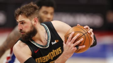 May 6, 2021; Detroit, Michigan, USA; Memphis Grizzlies center Jonas Valanciunas (17) holds the ball during the fourth quarter against the Detroit Pistons at Little Caesars Arena. Mandatory Credit: Raj Mehta-USA TODAY Sports