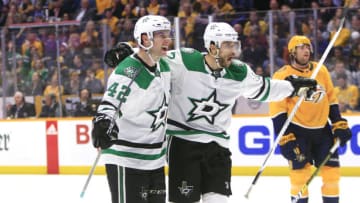 NASHVILLE, TN - FEBRUARY 07: Dallas Stars defenseman Taylor Fedun (42) and left wing Andrew Cogliano (17) celebrate a third period game-tying goal by Fedun during the NHL game between the Nashville Predators and Dallas Stars, held on February 7, 2019, at Bridgestone Arena in Nashville, Tennessee. (Photo by Danny Murphy/Icon Sportswire via Getty Images)