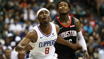 HONOLULU, HI - OCTOBER 03: Maurice Harkless #8 of the Los Angeles Clippers and Ben McLemore #16 of the Houston Rockets battle for position under the basket doing a free throw at the Stan Sheriff Center on October 3, 2019 in Honolulu, Hawaii. TO USER: User expressly acknowledges and agrees that, by downloading and/or using this photograph, user is consenting to the terms and conditions of the Getty Images License Agreement. (Photo by Darryl Oumi/Getty Images)