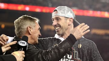 SANTA CLARA, CALIFORNIA - JANUARY 19: Head coach Kyle Shanahan of the San Francisco 49ers celebrates with his father, Mike Shanahan, after winning the NFC Championship game against the Green Bay Packers at Levi's Stadium on January 19, 2020 in Santa Clara, California. The 49ers beat the Packers 37-20. (Photo by Ezra Shaw/Getty Images)
