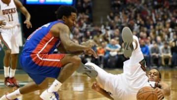 Jan 24, 2015; Milwaukee, WI, USA;Detroit Pistons guard Brandon Jennings (7) and Milwaukee Bucks guard Brandon Knight (11) battle for a loose ball in the third quarter at BMO Harris Bradley Center. Mandatory Credit: Benny Sieu-USA TODAY Sports