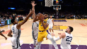 LOS ANGELES, CA - OCTOBER 29: Anthony Davis #3 of the Los Angeles Lakers pulls down a rebound against Bruno Caboclo #5, Marko Guduric #23 and Grayson Allen #3 of the Memphis Grizzlies during the second half of the basketball game at Staples Center on October 29, 2019 in Los Angeles, California. NOTE TO USER: User expressly acknowledges and agrees that, by downloading and/or using this Photograph, user is consenting to the terms and conditions of the Getty Images License Agreement. (Photo by Kevork Djansezian/Getty Images)