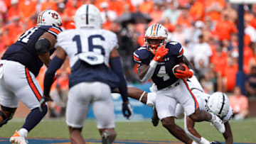 Auburn footballSep 17, 2022; Auburn, Alabama, USA; Auburn Tigers running back Tank Bigsby (4) carries against the Penn State Nittany Lions during the first quarter at Jordan-Hare Stadium. Mandatory Credit: John Reed-USA TODAY Sports