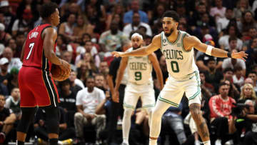 Jayson Tatum #0 of the Boston Celtics defends Kyle Lowry #7 of the Miami Heat (Photo by Megan Briggs/Getty Images)