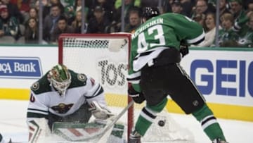 Jan 9, 2016; Dallas, TX, USA; Minnesota Wild goalie Devan Dubnyk (40) makes a save against Dallas Stars right wing Valeri Nichushkin (43) during the second period at American Airlines Center. Mandatory Credit: Jerome Miron-USA TODAY Sports