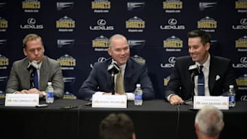 Jun 16, 2015; Denver, CO, USA; Denver Nuggets head coach Michael Malone (center) and general manager GM Tim Connelly (left) and president Josh Kroenke (right) during a press conference at the Pepsi Center. Mandatory Credit: Ron Chenoy-USA TODAY Sports