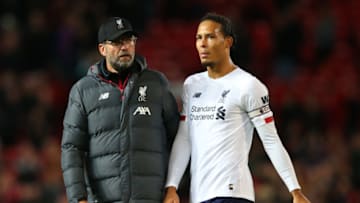 MANCHESTER, ENGLAND - OCTOBER 20: Jurgen Klopp, Manager of Liverpool and Virgil van Dijk of Liverpool look on during the Premier League match between Manchester United and Liverpool FC at Old Trafford on October 20, 2019 in Manchester, United Kingdom. (Photo by Alex Livesey/Getty Images)