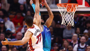 Omer Yurtseven #77 of the Miami Heat blocks a dunk by Miles Bridges #0 of the Charlotte Hornets(Photo by Michael Reaves/Getty Images)