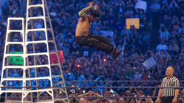 HOUSTON - APRIL 05: Jeff Hardy leaps off a ladder onto the body of brother Matt during an extreme rules match at "WrestleMania 25" at the Reliant Stadium on April 5, 2009 in Houston, Texas. (Photo by Bob Levey/WireImage)