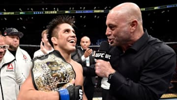 LOS ANGELES, CA - AUGUST 04: Henry Cejudo is interviewed by Joe Rogan after his split-decision victory over Demetrious Johnson in their UFC flyweight championship fight during the UFC 227 event inside Staples Center on August 4, 2018 in Los Angeles, California. (Photo by Jeff Bottari/Zuffa LLC/Zuffa LLC via Getty Images)