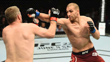 LIVERPOOL, ENGLAND - MAY 27: (R-L) Tom Breese of England punches Daniel Kelly of Australia in their middleweight bout during the UFC Fight Night event at ECHO Arena on May 27, 2018 in Liverpool, England. (Photo by Josh Hedges/Zuffa LLC/Zuffa LLC via Getty Images)