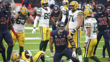 Oct 25, 2020; Houston, Texas, USA; Houston Texans defensive end J.J. Watt (99) reacts after making a tackle of Green Bay Packers running back Jamaal Williams (30) during the fourth quarter at NRG Stadium. Mandatory Credit: Troy Taormina-USA TODAY Sports