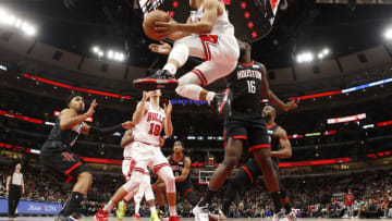 CHICAGO, ILLINOIS - DECEMBER 20: Devon Dotson #3 of the Chicago Bulls looks to pass against the Houston Rockets during the second half at the United Center on December 20, 2021 in Chicago, Illinois. The Bulls defeated the Rockets 133-118. NOTE TO USER: User expressly acknowledges and agrees that, by downloading and or using this photograph, User is consenting to the terms and conditions of the Getty Images License Agreement. (Photo by Nuccio DiNuzzo/Getty Images)