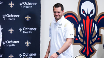 Mar 11, 2023; Metairie, LA, USA; New Orleans Saints quarterback Derek Carr (4) speaks at Ochsner Sports Performance Center. Mandatory Credit: Stephen Lew-USA TODAY Sports