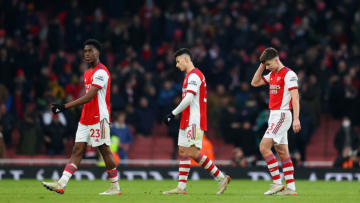 LONDON, ENGLAND - JANUARY 23: Albert Sambi Lokonga, Gabriel Martinelli and Kieran Tierney of Arsenal look dejected following the Premier League match between Arsenal and Burnley at Emirates Stadium on January 23, 2022 in London, England. (Photo by Catherine Ivill/Getty Images)