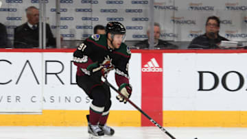 GLENDALE, ARIZONA - FEBRUARY 01: Taylor Hall #91 of the Arizona Coyotes skates the puck up ice against the Chicago Blackhawks at Gila River Arena on February 01, 2020 in Glendale, Arizona. (Photo by Norm Hall/NHLI via Getty Images)