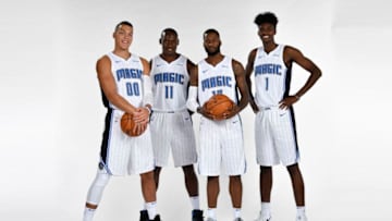 ORLANDO, FL - SEPTEMBER 25: Aaron Gordon #00 Bismack Biyombo #11 Jonathon Simmons #17 and Jonathan Isaac #1 of the Orlando Magic pose for a portrait during NBA Media Day on September 25, 2017 at Amway Center in Orlando, Florida. NOTE TO USER: User expressly acknowledges and agrees that, by downloading and or using this photograph, User is consenting to the terms and conditions of the Getty Images License Agreement. Mandatory Copyright Notice: Copyright 2017 NBAE (Photo by Fernando Medina/NBAE via Getty Images)