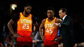 PORTLAND, OR - APRIL 11: Head Coach Quin Snyder of the Utah Jazz talks to Donavan Mitchell #45 and Royce O'Neale #23 against the Portland Trail Blazers Moda Center on April 11, 2018 in Portland, Oregon. (Photo by Jonathan Ferrey/Getty Images)