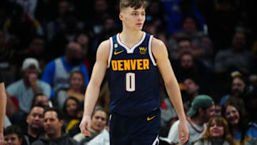 Nov 28, 2022; Denver, Colorado, USA; Denver Nuggets guard Christian Braun (0) during the fourth quarter against the Houston Rockets at Ball Arena. Mandatory Credit: Ron Chenoy-USA TODAY Sports