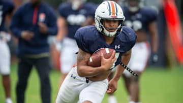 Auburn football running back Jarquez Hunter (27) runs drills during Auburn Tigers football practice at the Woltosz Football Performance Center at in Auburn, Ala., on Monday, April 3, 2023.
