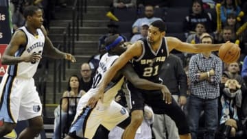 Jan 7, 2014; Memphis, TN, USA; Memphis Grizzlies power forward Zach Randolph (50) guards San Antonio Spurs power forward Tim Duncan (21) during the first overtime at FedExForum. the San Antonio Spurs beat the Memphis Grizzlies 110 - 108 Mandatory Credit: Justin Ford-USA TODAY Sports