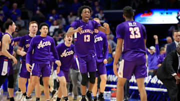 LEXINGTON, KENTUCKY - NOVEMBER 12: Deandre Williams #13 and K.J. Riley #33 of the Evansville Aces celebrate in the 67-64 win over the Kentucky Wildcats at Rupp Arena on November 12, 2019 in Lexington, Kentucky. (Photo by Andy Lyons/Getty Images)