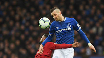 LIVERPOOL, ENGLAND - MARCH 03: Morgan Schneiderlin of Everton outjumps Georginio Wijnaldum of Liverpool during the Premier League match between Everton FC and Liverpool FC at Goodison Park on March 03, 2019 in Liverpool, United Kingdom. (Photo by Shaun Botterill/Getty Images)