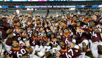 The Virginia Tech Hokies after their Belk Bowl victory. (Photo by Streeter Lecka/Getty Images)