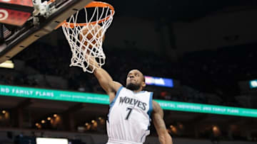 Apr 15, 2015; Minneapolis, MN, USA; Minnesota Timberwolves guard Lorenzo Brown (7) dunks the ball in the fourth quarter against the Oklahoma City Thunder at Target Center. Mandatory Credit: Brad Rempel-USA TODAY Sports