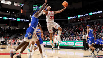 Cincinnati Bearcats guard Mika Adams-Woods shoots against Memphis Tigers at Fifth Third Arena. Getty Images.