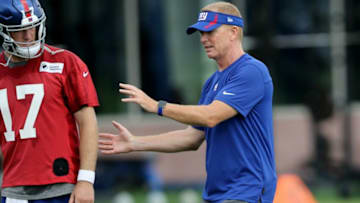Giants Offensive Coordinator, Jason Garrett is shown near quarterback, Clayton Thorson. Wednesday, July 28, 2021Giants