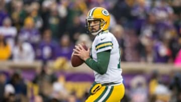 Nov 23, 2014; Minneapolis, MN, USA; Green Bay Packers quarterback Aaron Rodgers (12) passes against the Minnesota Vikings in the first quarter at TCF Bank Stadium. Mandatory Credit: Bruce Kluckhohn-USA TODAY Sports