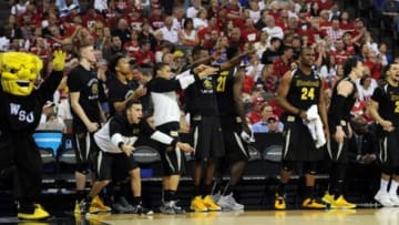 Mar 22, 2015; Omaha, NE, USA; Wichita State Shockers players celebrate after a basket against the Kansas Jayhawks during the second half in the third round of the 2015 NCAA Tournament at CenturyLink Center. Mandatory Credit: Steven Branscombe-USA TODAY Sports